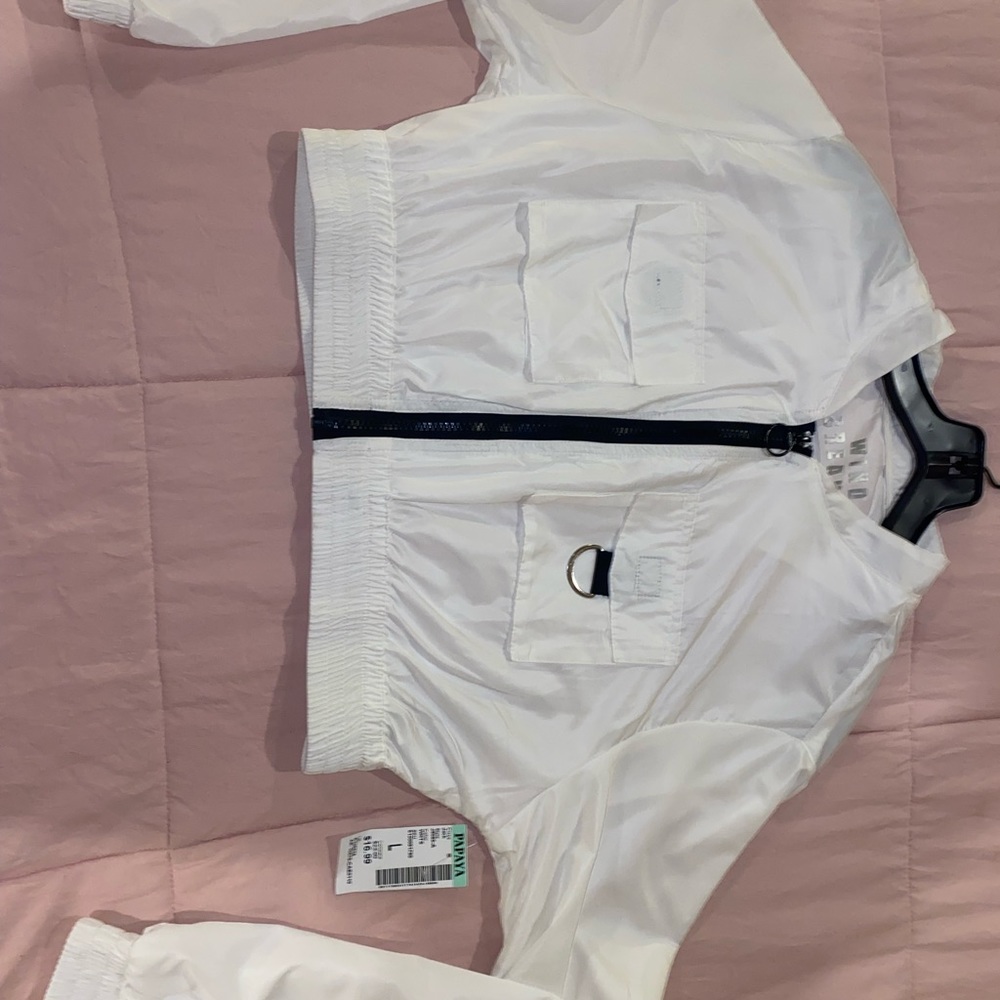 White windbreaker